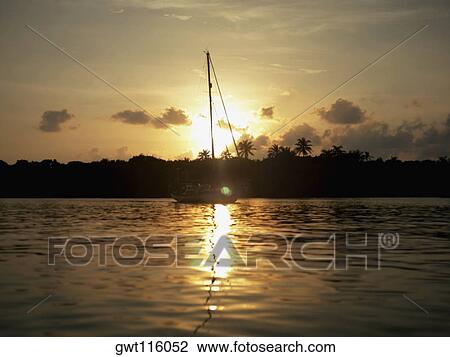 Sailboat in the sea View Large Photo Image Stock Image - Sailboat in the sea. Fotosearch
