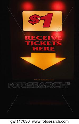 Stock Photograph - Close-up of an arrow sign on a slot machine, Las Vegas, Nevada, USA. Fotosearch
