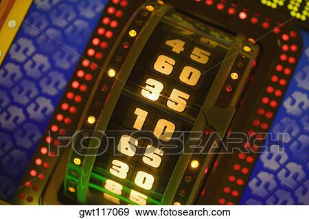 Stock Photo - Close-up of an illuminated number wheel in a casino, Las Vegas, Nevada, USA. Fotosearch