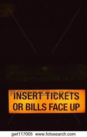 Stock Photography - Glowing sign on a vending machine, Las Vegas, Nevada, USA. Fotosearch