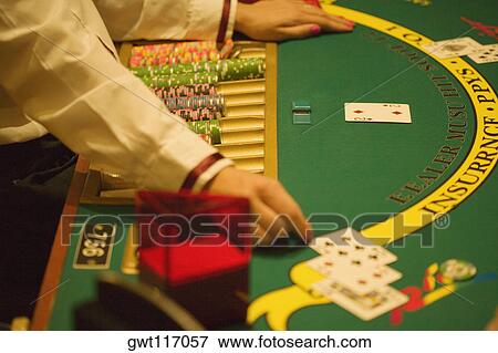 High angle view of a casino worker playing blackjack, Las Vegas, Nevada, USA View Large Photo Image Stock Photo - High angle view of a casino worker playing blackjack, Las Vegas, Nevada, USA. Fotosearch