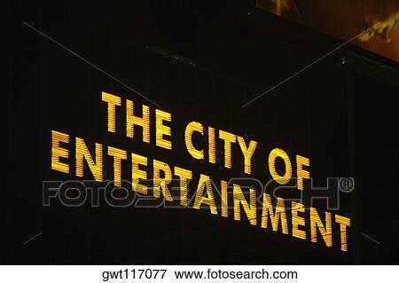 Stock Photo - Low angle view of a glowing signboard, Las Vegas, Nevada, USA. Fotosearch