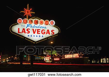 Stock Image - Welcome sign lit up at night, Las Vegas, Nevada, USA. Fotosearch