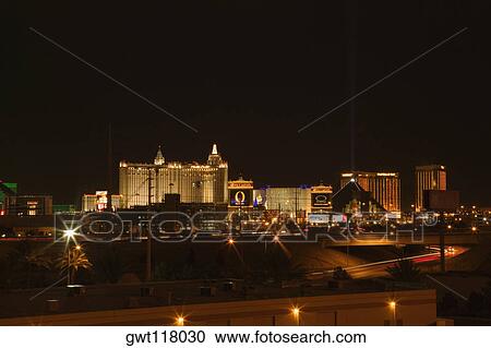 Stock Image - Buildings in a city lit up at night, Las Vegas, Nevada, USA. Fotosearch