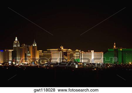 Buildings in a city lit up at night, Las Vegas, Nevada, USA View Large Photo Image Stock Photo - Buildings in a city lit up at night, Las Vegas, Nevada, USA. Fotosearch