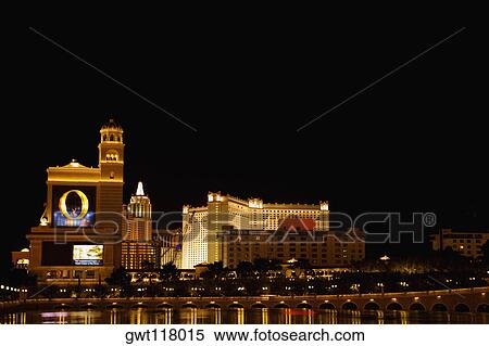 Buildings in a city lit up at night, Las Vegas, Nevada, USA View Large Photo Image Stock Photography - Buildings in a city lit up at night, Las Vegas, Nevada, USA. Fotosearch