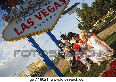Mid adult men and mid adult women dressed in costumes, Las Vegas, Nevada, USA View Large Photo Image Stock Image - Mid adult men and mid adult women dressed in costumes, Las Vegas, Nevada, USA. Fotosearch