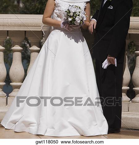 Newlywed couple standing near a balustrade, Las Vegas, Nevada, USA View Large Photo Image Stock Image - Newlywed couple standing near a balustrade, Las Vegas, Nevada, USA. Fotosearch