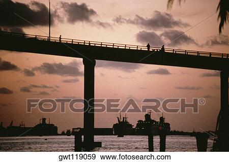 Low angle view of a bridge silhouetted against the sky, Nassau, Bahamas View Large Photo Image Stock Photo - Low angle view of a bridge silhouetted against the sky, Nassau, Bahamas. Fotosearch