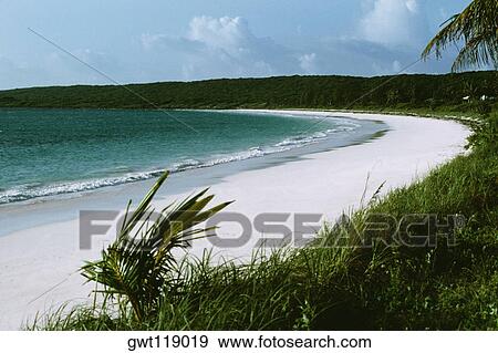Stock Photo - Scenic view of a beach at Cotton Bay Resort, Eleuthera, Bahamas. Fotosearch