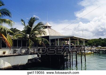 Side view of a house on stilts, Abaco, Bahamas View Large Photo Image Stock Photography - Side view of a house on stilts, Abaco, Bahamas. Fotosearch