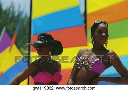Two fashionable young women standing in front of sails at Crystal Palace Hotel, Nassau, Bahamas View Large Photo Image Stock Image - Two fashionable young women standing in front of sails at Crystal Palace Hotel, Nassau, Bahamas. Fotosearch