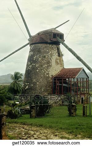 A deserted windmill once used to process sugar cane at Barbados, Caribbean View Large Photo Image Stock Photography - A deserted windmill once used to process sugar cane at Barbados, Caribbean. Fotosearch