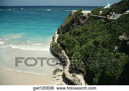 A rugged rock formation is seen next to a beach at Barbados coast, Caribbean View Large Photo Image Stock Photograph - A rugged rock formation is seen next to a beach at Barbados coast, Caribbean. Fotosearch