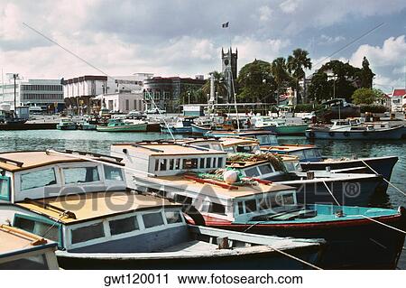 Stock Image - High angle view of anchored boats on a sunny day, Barbados. Fotosearch