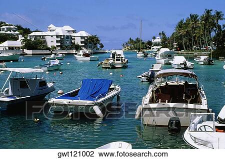 Stock Image - Several boats are harbored in the ocean, Bermuda. Fotosearch