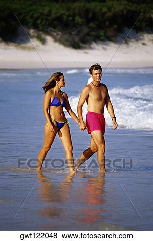 A couple running through the seawater, Horse-shoe Bay beach, Bermuda View Large Photo Image Stock Photo - A couple running through the seawater, Horse-shoe Bay beach, Bermuda. Fotosearch