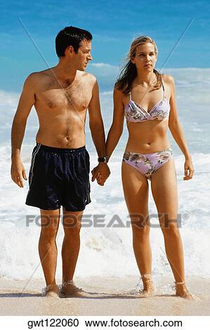 Front view of a couple in swimsuit, Horse-shoe Bay beach, Bermuda View Large Photo Image Stock Image - Front view of a couple in swimsuit, Horse-shoe Bay beach, Bermuda. Fotosearch