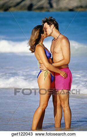 Side View Of A Couple Smooching Each Other Horse Shoe Bay Beach Bermuda Stock Image Gwt1243 Fotosearch