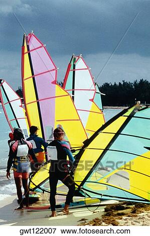Small group of windsurfers gearing up for a competition, Nassau, Bahamas View Large Photo Image Stock Photo - Small group of windsurfers gearing up for a competition, Nassau, Bahamas. Fotosearch