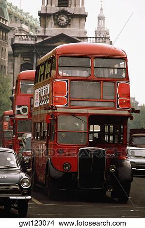 A double decker bus on a busy street, London, England View Large Photo Image Picture - A double decker bus on a busy street, London, England. Fotosearch