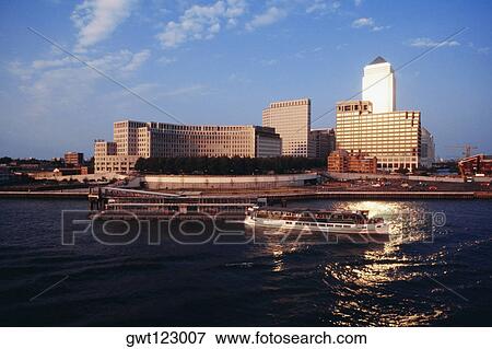 Distant view of Canary Wharf, River Thames in London, England View Large Photo Image Stock Photo - Distant view of Canary Wharf, River Thames in London, England. Fotosearch