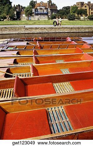 High angle view of red punts arranged in a row, Cambridge, England View Large Photo Image Stock Photo - High angle view of red punts arranged in a row, Cambridge, England. Fotosearch