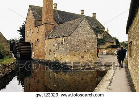 Side view of an old mill, Bourton-on-the-water, England View Large Photo Image Stock Photo - Side view of an old mill, Bourton-on-the-water, England. Fotosearch