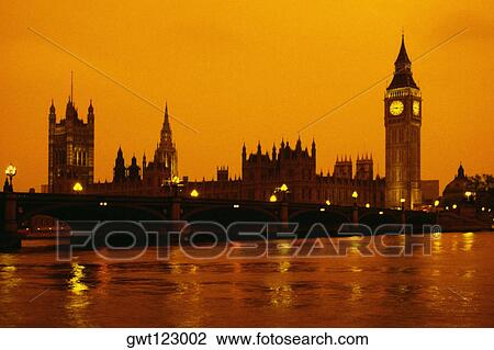 Side view of the Parliament and Thames river at sunset, London, England View Large Photo Image Stock Image - Side view of the Parliament and Thames river at sunset, London, England. Fotosearch
