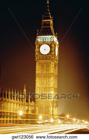 Spectacular view of Big Ben with trails of vehicles at night, London, England View Large Photo Image Stock Photograph - Spectacular view of Big Ben with trails of vehicles at night, London, England. Fotosearch