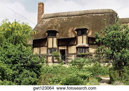 Tourists taking a tour of Anne Hathway's cottage, Stratford, England View Large Photo Image Picture - Tourists taking a tour of Anne Hathway's cottage, Stratford, England. Fotosearch