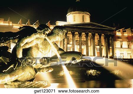 View of the Trafalgar fountain statue at night, London, England View Large Photo Image Stock Image - View of the Trafalgar fountain statue at night, London, England. Fotosearch