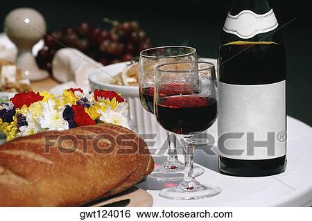 Close up of Burgundy wine and French bread arranged on a table, France View Large Photo Image Stock Photograph - Close up of Burgundy wine and French bread arranged on a table, France. Fotosearch