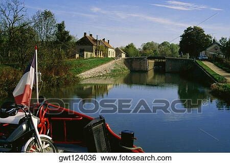 Luxury cruise barge transporting goods over a river, France View Large Photo Image Stock Photograph - Luxury cruise barge transporting goods over a river, France. Fotosearch