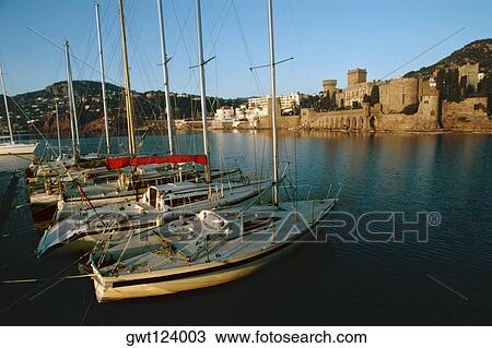 Sailboats at La Napoule Harbor near a castle, Cotep'Azur, France View Large Photo Image Stock Image - Sailboats at La Napoule Harbor near a castle, Cotep'Azur, France. Fotosearch