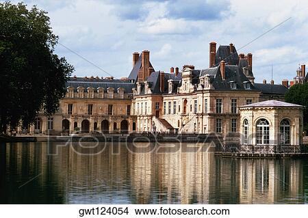 View to Fountainbleau chateau on a riverbank, France View Large Photo Image Picture - View to Fountainbleau chateau on a riverbank, France. Fotosearch