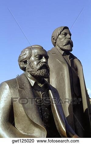 Close-up of two statues, Marx and Engle statues, Berlin, Germany View Large Photo Image Stock Image - Close-up of two statues, Marx and Engle statues, Berlin, Germany. Fotosearch
