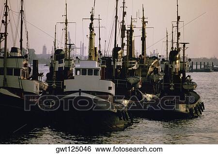 Tugboats in the sea, Hamburg, Germany View Large Photo Image Stock Photograph - Tugboats in the sea, Hamburg, Germany. Fotosearch