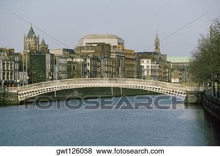 Stock Photo - Bridge over a river, Half Penny Bridge, River Liffey, Dublin, Republic of Ireland. Fotosearch