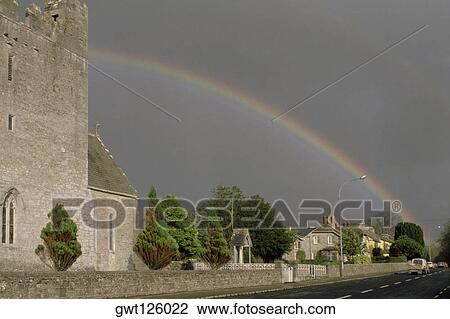 Rainbow over buildings, Adare, Republic of Ireland View Large Photo Image Stock Image - Rainbow over buildings, Adare, Republic of Ireland. Fotosearch