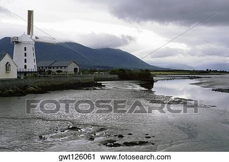 Windmill on the banks of a river, Blennerville, Republic of Ireland View Large Photo Image Stock Image - Windmill on the banks of a river, Blennerville, Republic of Ireland. Fotosearch