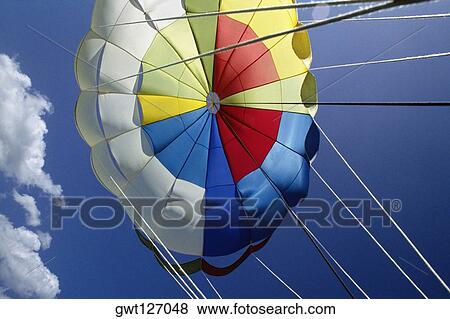 View of the canopy of a parasail, Negril Beach, Jamaica View Large Photo Image Stock Photo - View of the canopy of a parasail, Negril Beach, Jamaica. Fotosearch