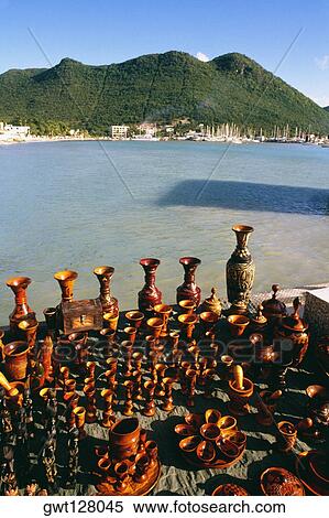 A variety of wooden souvenirs are displayed on a seashore, St. Maarten, Caribbean View Large Photo Image Stock Photography - A variety of wooden souvenirs are displayed on a seashore, St. Maarten, Caribbean. Fotosearch