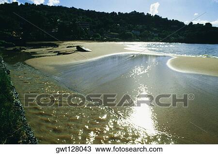 A view of a calm seashore, St. Lucia, Caribbean. View Large Photo Image Stock Image - A view of a calm seashore, St. Lucia, Caribbean.. Fotosearch