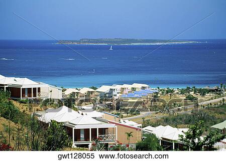 High angle view of houses along the seashore, Marigot, St. Martin, Leeward Islands, Caribbean. View Large Photo Image Stock Photography - High angle view of houses along the seashore, Marigot, St. Martin, Leeward Islands, Caribbean.. Fotosearch