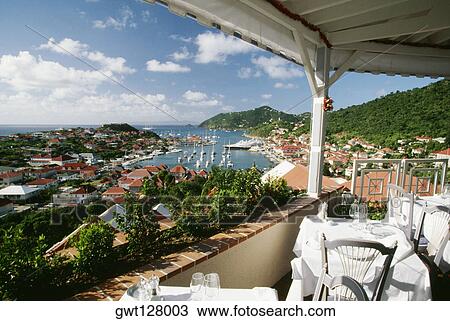 Side view of a restaurant overlooking a coastline, St. Bant's View Large Photo Image Stock Image - Side view of a restaurant overlooking a coastline, St. Bant's. Fotosearch