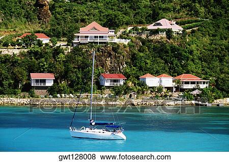 Side view of a sail boat in the sea, St. Bant's View Large Photo Image Stock Photo - Side view of a sail boat in the sea, St. Bant's. Fotosearch