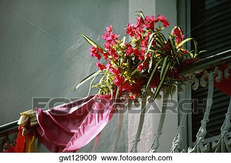 A bouquet of flowers tied to a handrail, San Juan, Puerto Rico View Large Photo Image Stock Photo - A bouquet of flowers tied to a handrail, San Juan, Puerto Rico. Fotosearch