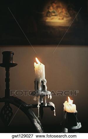 Front view of melted lit up candles, Old San Juan, Puerto Rico View Large Photo Image Stock Photo - Front view of melted lit up candles, Old San Juan, Puerto Rico. Fotosearch