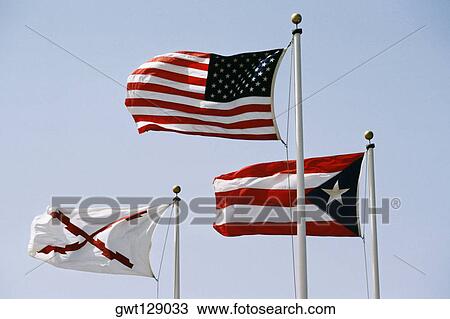 Front view of three fluttering flags, El Morro Fort, San Juan, Puerto Rico View Large Photo Image Stock Image - Front view of three fluttering flags, El Morro Fort, San Juan, Puerto Rico. Fotosearch